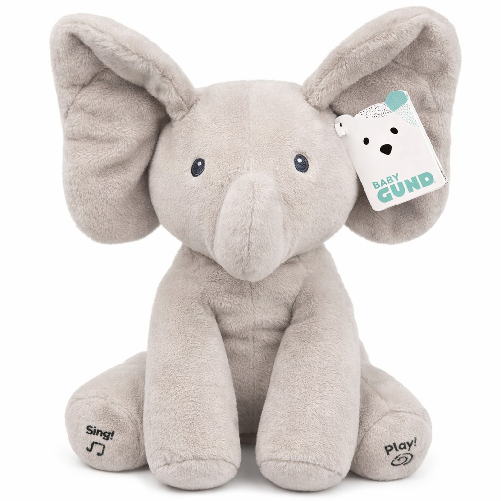 Plush elephant toy with a Baby Gund tag on a white background